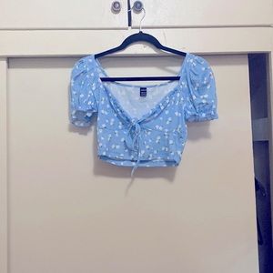 Light blue top with flowers from Shein in size medium